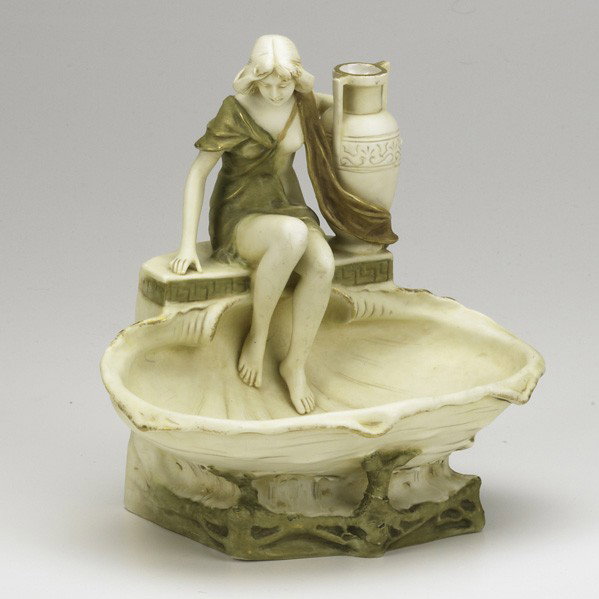 ALOIS HAMPEL; ROYAL DUX: ALOIS HAMPEL; ROYAL DUX; Art Nouveau porcelain figural bowl with woman seated on a shell, early 20th c.; Marked; 9 1/2' x 9'' x 7''