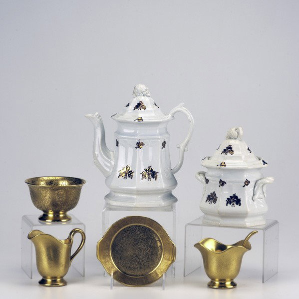 COFFEE GROUP: COFFEE GROUP; Five pieces: Pickard gold porcelain together with English relief-decorated and copper lustre ironstone coffee pot and creamer; Largest: 9''