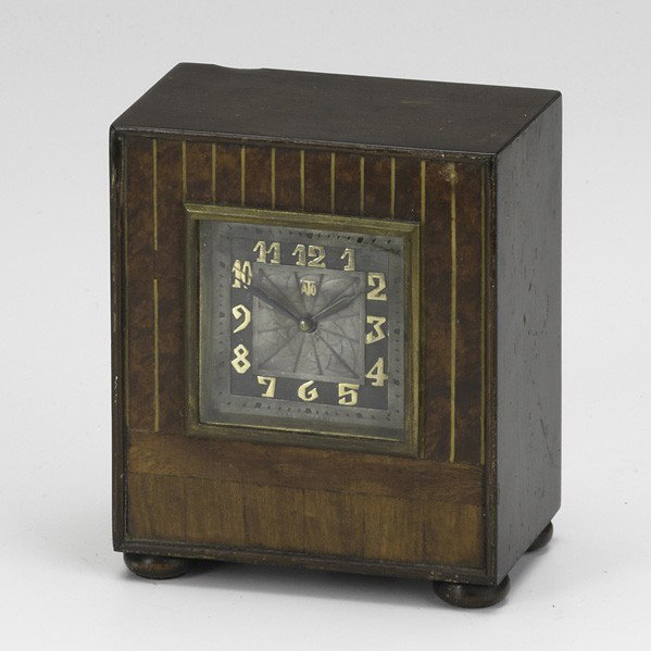 LEON HATOT; ATO/HERMAN MILLER CLOCK CO: LEON HATOT; ATO/ HERMAN MILLER CLOCK CO; Desk clock; Rosewood, burl, ivorine and brass; Marked ATO/Made in France and Herman Miller Co. metal tag; 5 1/2'' x 4 3/4'' x 3''