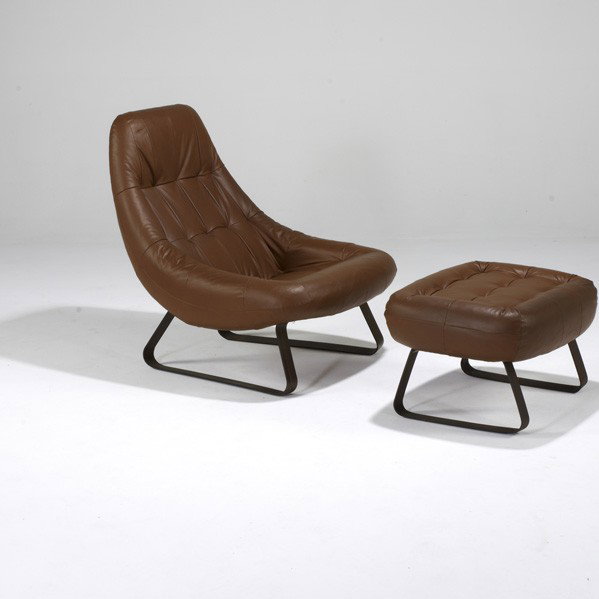 PERCIVAL LAFER: PERCIVAL LAFER; Lounge chair and ottoman, Brazil, 1960s; Leather and rosewood veneer over metal legs; Paper labels; Chair: 35'' x 29'' x 34'' and ottoman: 15'' x 26'' x 21''