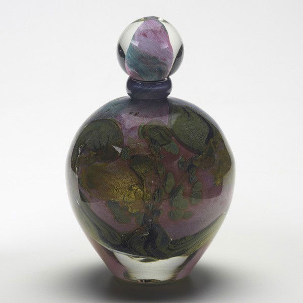 JEAN-CLAUDE NOVARO: JEAN-CLAUDE NOVARO; Cased art glass bottle with stopper in pink, blue, green and gold foil; Etched J.C. Novaro/1987; 9'' x 6'' dia