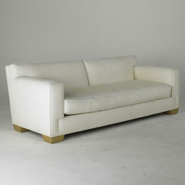 JOHN HUTTON; DONGHIA: JOHN HUTTON; DONGHIA; Sofa, USA, 1980's; Sculpted wool upholstery on wood block feet; Fabric label; 30 1/2'' x 86'' x 37''