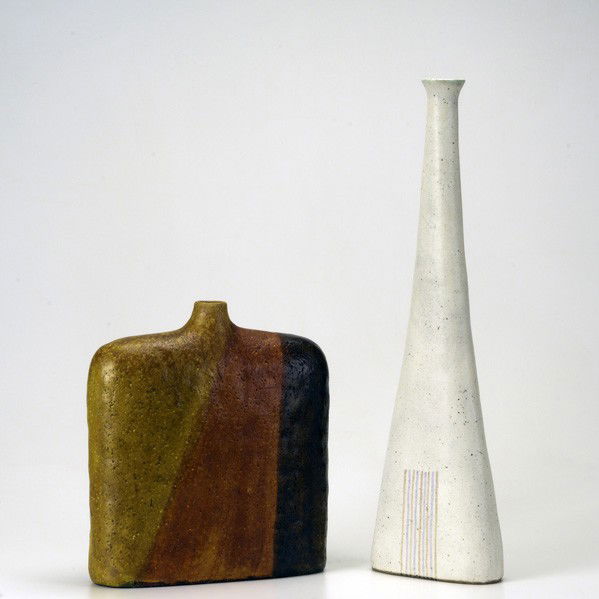 GUIDO GAMBONE; MARCELLO FANTONI: GUIDO GAMBONE; MARCELLO FANTONI; Tall bottle-shaped vase in white glaze signed Gambone/ Italy together with pillow vase in earth-tone glazes signed Fantoni/Italy for Raymor; Taller: 18''