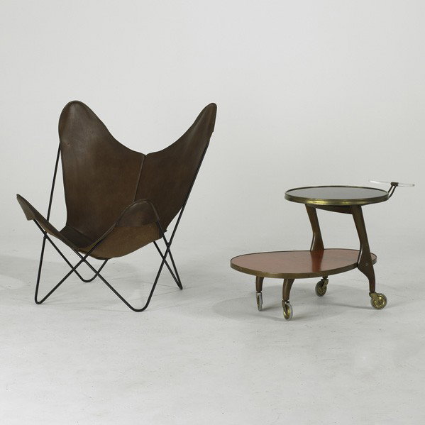 KNOLL: KNOLL; Butterfly chair together with European drinks cart; Saddle leather, enameled steel, Lucite, laminate, brass and walnut; Chair: 35'' x 32'' x 30''