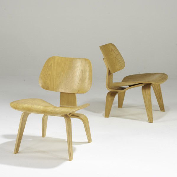 CHARLES & RAY EAMES; HERMAN MILLER: CHARLES & RAY EAMES; HERMAN MILLER; Pair of ash lounge chairs (LCW), USA, 1990s; Metal labels; Each: