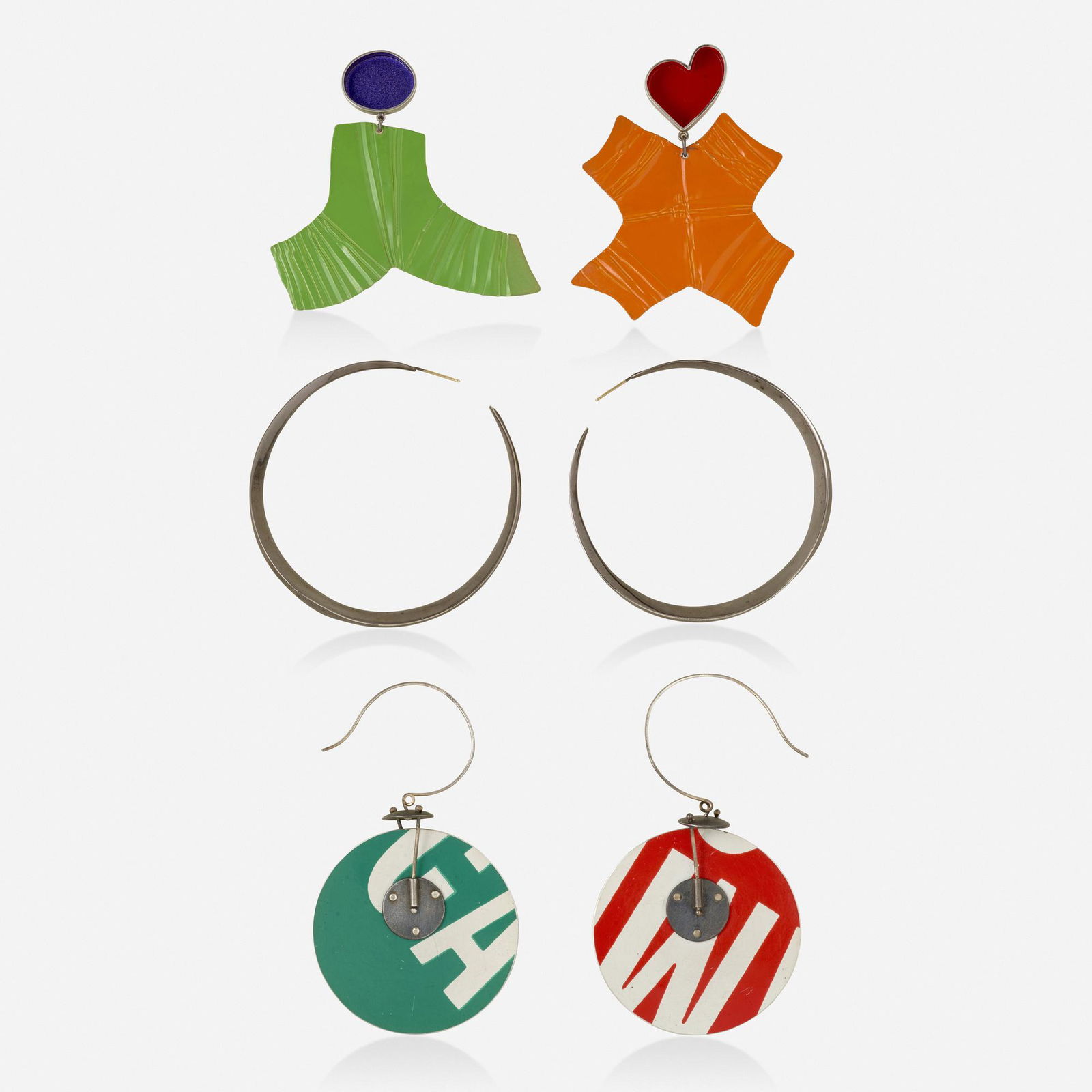 Three pairs of earrings: Three pairs of earrings Comprising a pair of earrings made from recycled traffic signs by Boris Bally; a pair of hoop earrings by Robert Lee Morris, c. 1995; and a pair of colorful earrings by ZAN; 19