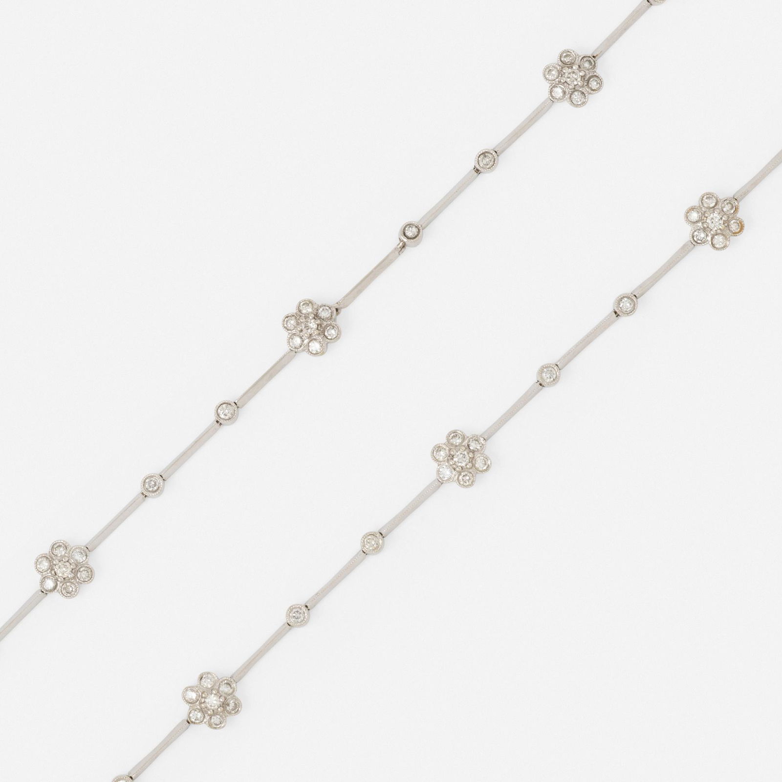 Two diamond and white gold bracelets (1 of 3)