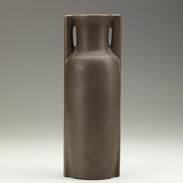 TECO; Two-handled vase: TECO; Tall two-handled vase, unusual matte mauve glaze, Terra Cotta, Illinois, ca. 1910; Stamped Teco 438; 11 1/2'' x 3 3/4''