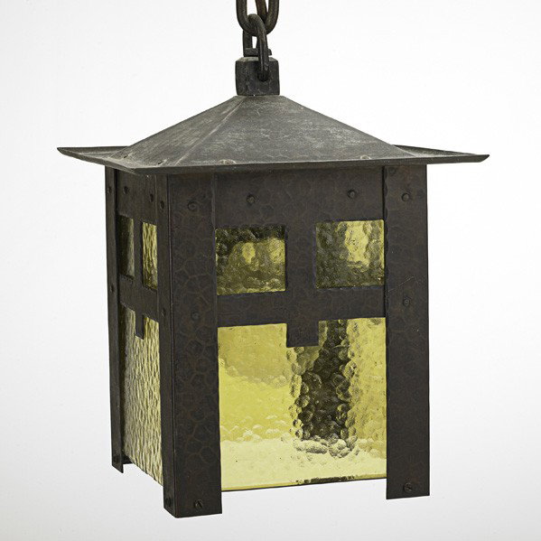 GUSTAV STICKLEY; Hanging lantern: GUSTAV STICKLEY; Hanging lantern, Eastwood NY, ca. 1910; Hammered copper, hammered amber glass; Provenance: property of a private collector, Delaware; Unmarked; Lantern: 9'' x 7'' sq., overall: 20''