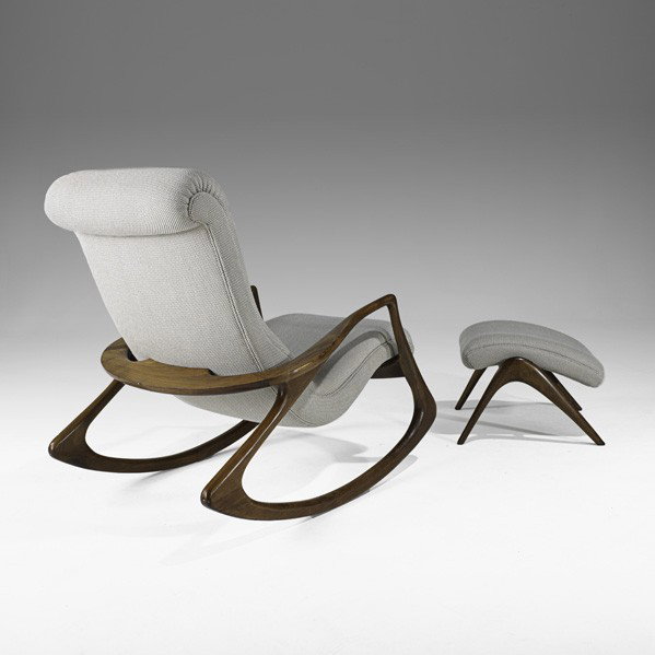 VLADIMIR KAGAN; Rocking chair and ottoman: VLADIMIR KAGAN; VLADIMIR KAGAN DESIGNS INC.; Rocking chair and ottoman (no. 175F and 175GH), USA, 1970s; Sculpted walnut, wood; Unmarked; Chair: 38'' x 32'' x 43'', ottoman: 15 1/2'' x 20 1/2'' x 21''