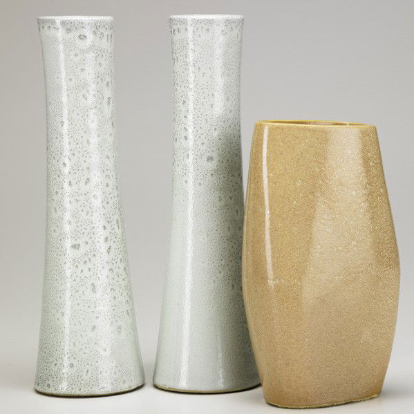 RUSSEL WRIGHT; BAUER; Candlesticks and vase: RUSSEL WRIGHT; BAUER; Pair of glazed ceramic candlesticks and vase, California, 1940s; Signed; Vase: 8'' x 4 1/2'', candlesticks: 11''