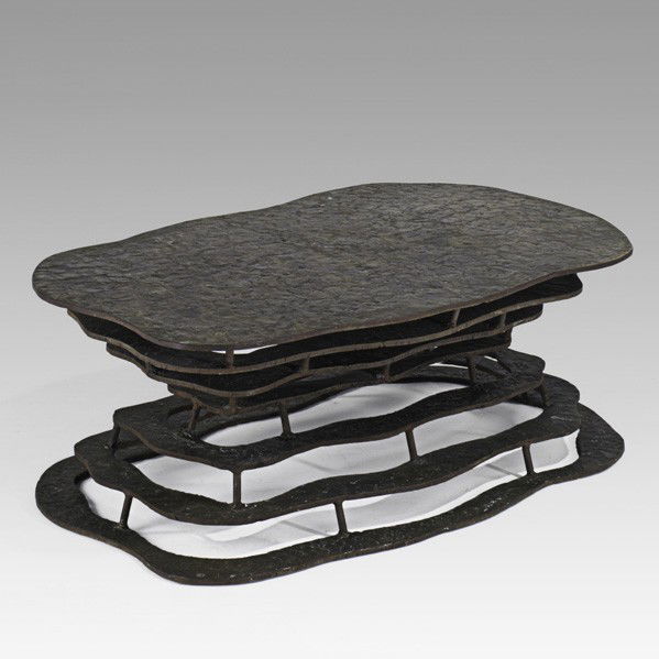 SILAS SEANDEL; Volcano coffee table: SILAS SEANDEL; Volcano coffee table, New York; Torch-cut, textured and welded bronze; Unmarked; 15 1/2'' x 42'' x 26 1/2''