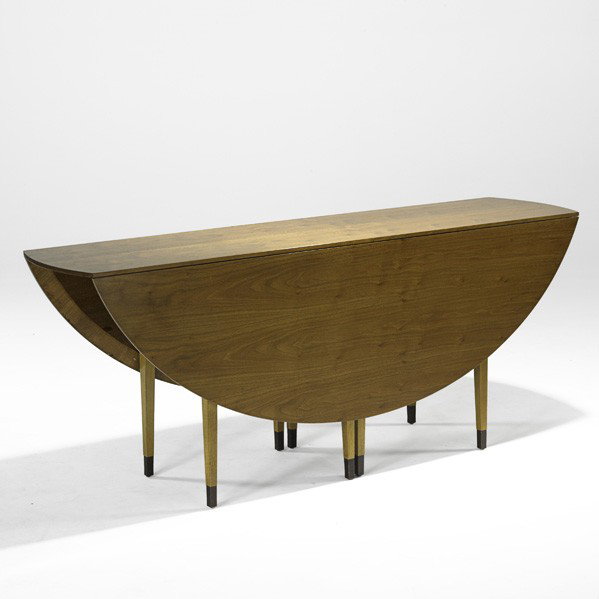 EDWARD WORMLEY; DUNBAR; Dining table: EDWARD WORMLEY; DUNBAR; Gate-leg dining table, USA, 1940s; Sap walnut, bleached mahogany, brass; Green metal label; Open: 29 1/2'' x 60'' x 72''