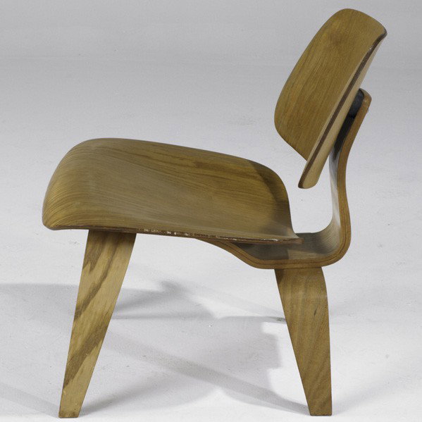 CHARLES AND RAY EAMES; Lounge chair: CHARLES AND RAY EAMES; EVANS PRODUCTS; Lounge chair, LCW, USA, 1945/1946; Oak and ash plywood, rubber; Decal label; 26 1/2'' x 22 1/2'' x 24 1/2''