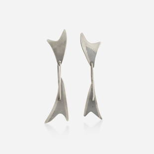 Art Smith, Silver earrings: Art Smith Silver earrings Of asymmetrical design; 1950s Silver Signed Art Smith 2.50 x 0.50 in; Gross weight 6.0 dwts Provenance: Property from the collection of Lillian Sykes I Thence by decent 