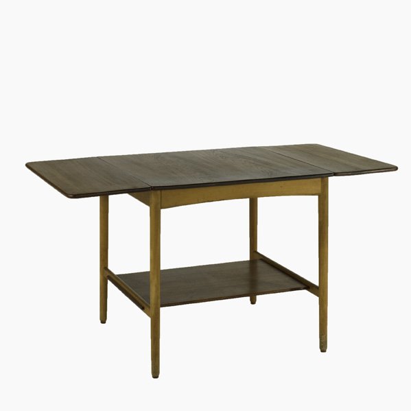 HANS WEGNER; ANDREAS TUCK; Drop-leaf lamp table, D: HANS WEGNER; ANDREAS TUCK; Drop-leaf lamp table, Denmark; 1960s; Teak and beech; Unmarked; As pictured: 24'' x 47'' x 23 3/4''