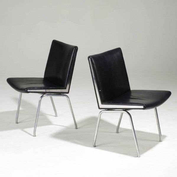 HANS WEGNER; JOHANNES HANSEN; Pair of side chairs,: HANS WEGNER; JOHANNES HANSEN; Pair of side chairs, Denmark, 1960s; Leather and matte chromed steel; Metal and foil labels; Each: 31'' x 19 1/2'' x 22''