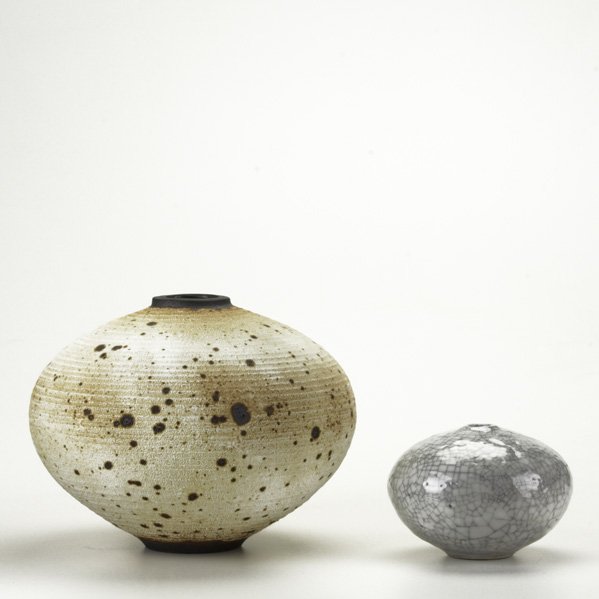 OTTO & VIVIKA HEINO; Two pieces: unglazed stonewar: OTTO & VIVIKA HEINO; Two pieces: unglazed stoneware vase and a raku vase; Both signed; Taller: 9''