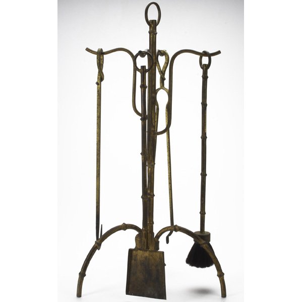 STYLE OF JACQUES ADNET; Four-piece gilt iron fire: STYLE OF JACQUES ADNET; Four-piece gilt iron fireplace tool set, France, c.1950; Unmarked; Overall: 33 1/2'' x 16'' dia