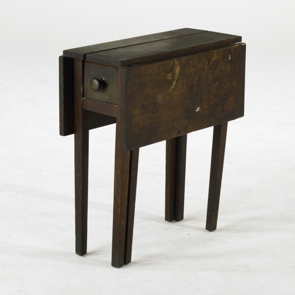 GUSTAV STICKLEY; Drop-leaf side table with single: GUSTAV STICKLEY; Drop-leaf side table with single drawer; Quartersawn oak, early 20th c.; Remains of paster; Closed: 24'' x 22'' x 9 1/2''