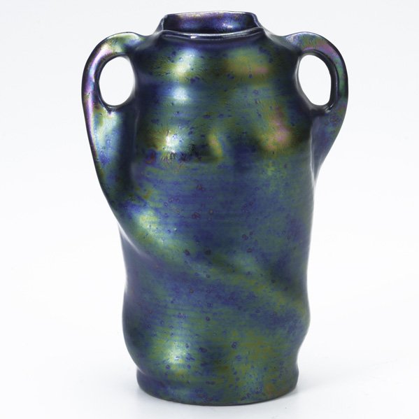 ZSOLNAY; Double-handled vase with in-body twist, c: ZSOLNAY; Double-handled vase with in-body twist, covered in lustre glaze; Unmarked; 7'' x 5'' x 4''