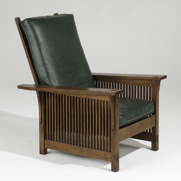 STICKLEY BY E.J. AUDI; Contemporary flat-arm spind: STICKLEY BY E.J. AUDI; Contemporary flat-arm spindled Morris chair with loose cushions, USA, late 20th c.; Quartersawn oak, oak veneer and leather; Stamped/metal tag; 38 1/2'' x 29'' x 34 1/2''
