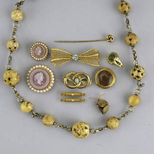COLLECTION OF GOLD AND SILVER JEWELRY: COLLECTION OF GOLD AND SILVER JEWELRY, ca. 1900; Fourteen pieces: Frank Walter Lawrence 14k and jade pine motif ring; Chinese carved bone bead and silver necklace; Two hardstone cameo gold pins with s