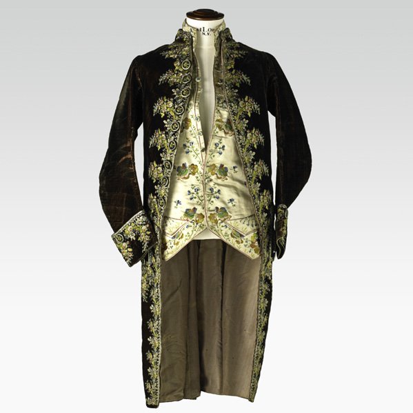 GENTLEMAN'S COURT SUIT: GENTLEMAN'S COURT SUIT; Silk waistcoat with embroidered floral design and overcoat in Manchester velvet with embroidered stylized floral motif decoration, late 18th/early 19th c.; Coat: 42''; Provenan