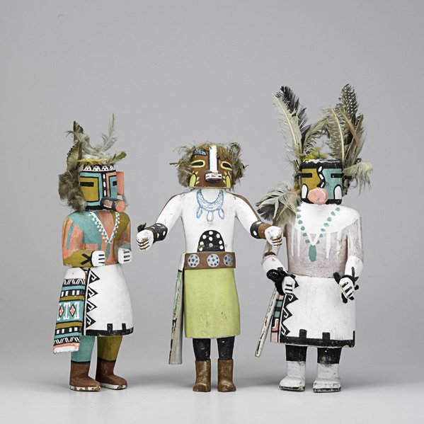 ROUTE 66 KACHINAS: ROUTE 66 KACHINAS; Three in cottonwood with polychrome decoration and feather attachments, 20th c.; Tallest: 16''