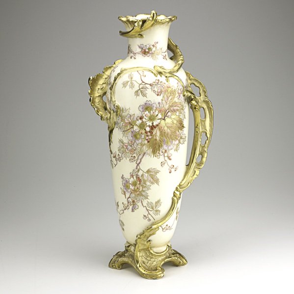 ROYAL BONN: ROYAL BONN; Tall cylindrical vase with hand-painted floral decoration and gilded vine handles, 19th/20th c.; Marked; 23''