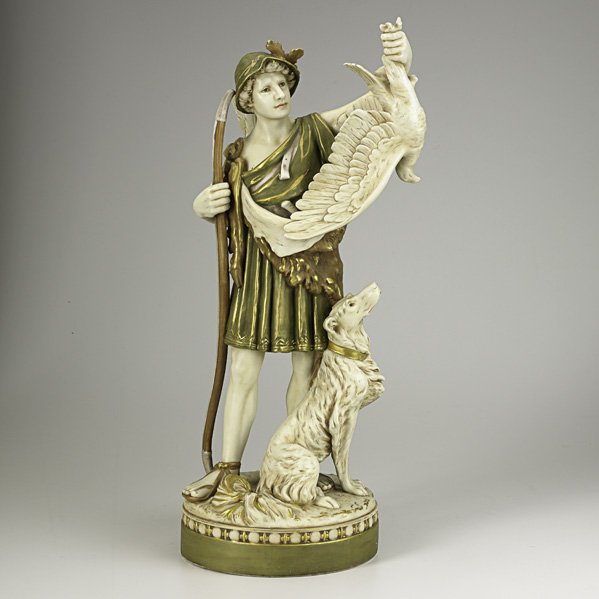 ROYAL DUX: ROYAL DUX; Porcelain figure of a Greek hunter with bird and dog, 19th/20th c.; Marked; 27'' x 9 1/2''