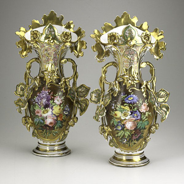 OLD PARIS PORCELAIN: OLD PARIS PORCELAIN; Pair of vases with hand-painted floral decoration and applied gilt foliate handles, 19th c.; Drilled for mounting as lamps; 20 1/2'' x 10 x 5 1/2''