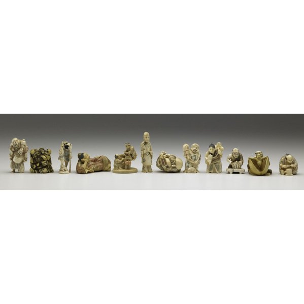 JAPANESE IVORY NETSUKE: JAPANESE IVORY NETSUKE; Twelve carved human figures, 20th c.; Largest: 1'' x 2 1/2'' x 1 1/2'' Note: International bids and bids issuing from the State of California may be subject to laws that forbid