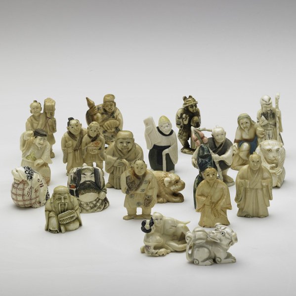 ASIAN IVORY: ASIAN IVORY; Twenty-one items including netsuke, 20th c.; Some marked; Largest: 2 1/4'' Note: International bids and bids issuing from the State of California may be subject to laws that forbid the ex