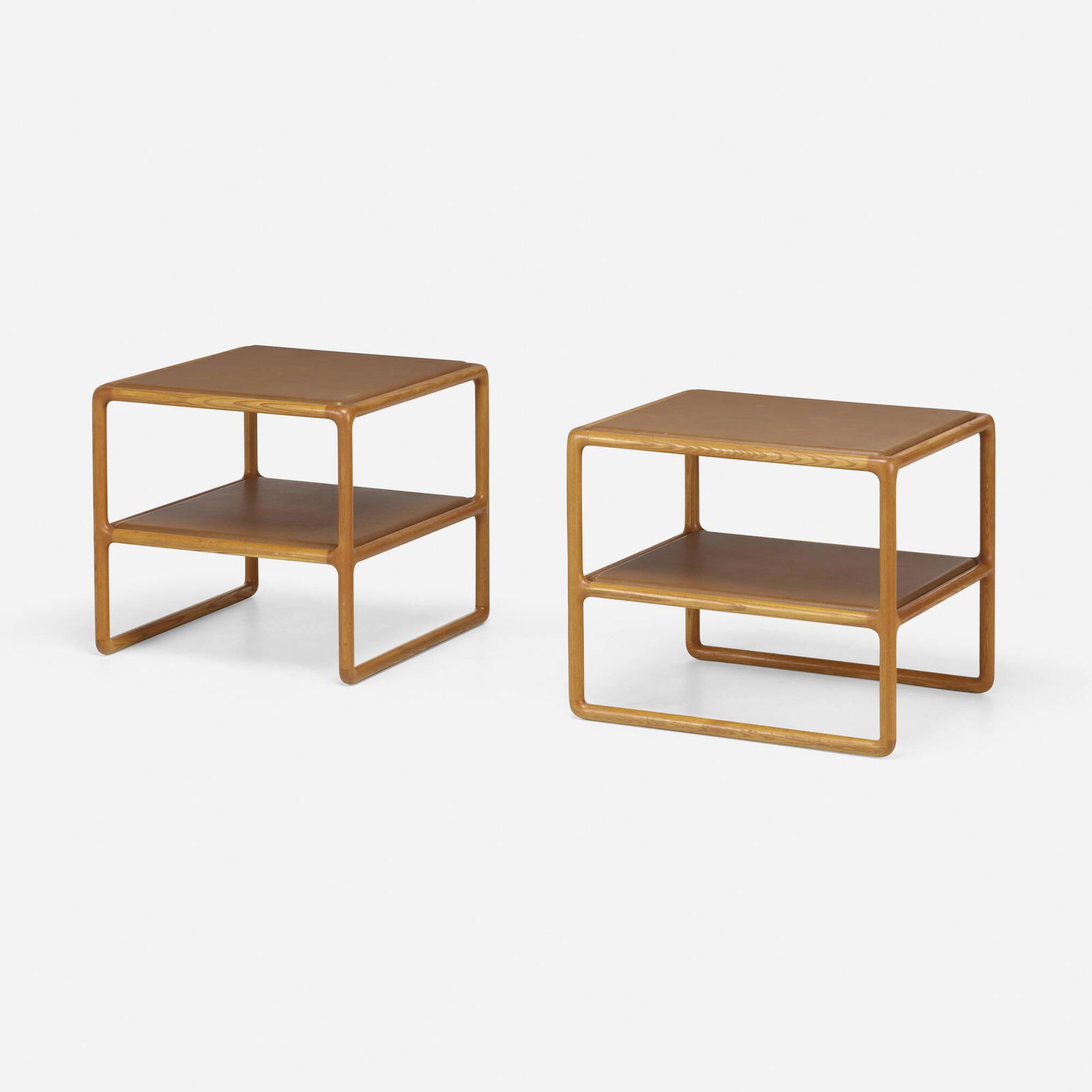 Ward Bennett, Occasional tables, pair: Ward Bennett Occasional tables, pair USA, c. 1975ash, leather 24 h x 27.5 w x 24.5 d in (61 x 70 x 62 cm) This work will ship from Lambertville, New Jersey.