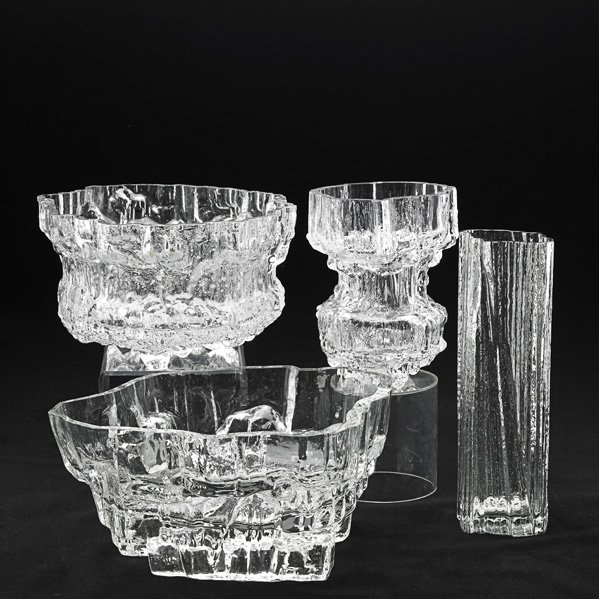 TAPIO WIRKKALA; IITTALA Four glass vessels: TAPIO WIRKKALA IITTALA Four glass vases, Finland, 1970s; Larger incised TAPIO WIRKKALA 2243, larger two have II decal; 6 3/4" x 14 1/2", 12 1/2" x 4 1/2"