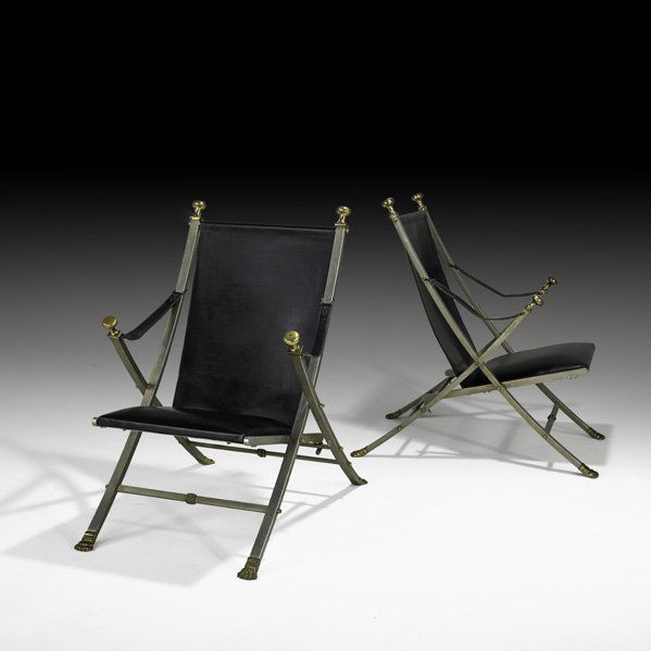MAISON JANSEN Pair of campaign lounge chairs: MAISON JANSEN Pair of campaign lounge chairs, France, 1970s; Matte-chromed steel, brass, stitched saddle leather; Feet stamped Italy; 37" x 24 1/4" x 35"