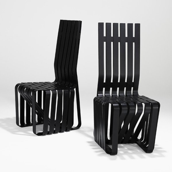 FRANK GEHRY Pair of High Sticking chairs: FRANK GEHRY KNOLL Pair of High Sticking chairs, USA, 1993; Ebonized and laminated maple; Branded with designer's signature, date, and manufacturer's mark; 43" x 20" x 22"