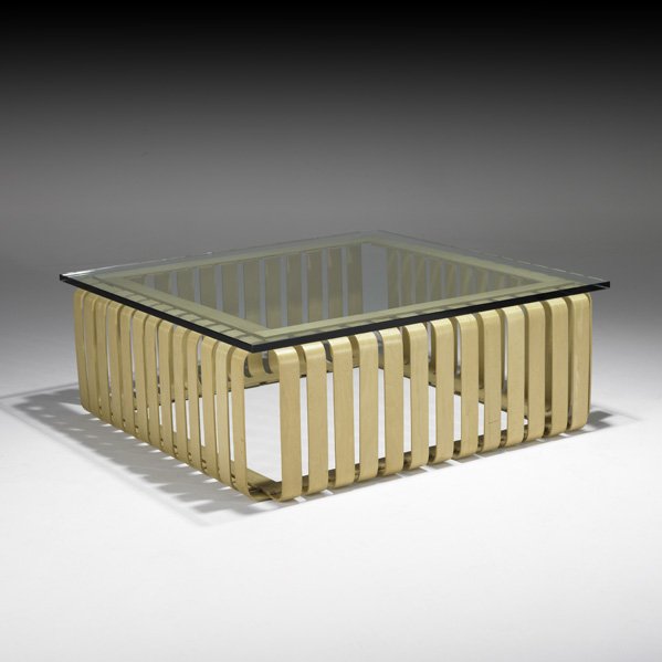FRANK GEHRY Icing coffee table: FRANK GEHRY KNOLL Icing coffee table, USA, 1993; Laminated maple; Branded with designer's signature, date, and manufacturer's mark; 15" x 40" sq.