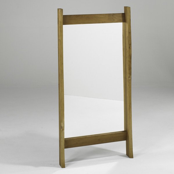 GEORGE NAKASHIMA Vertical Mirror: GEORGE NAKASHIMA NAKASHIMA STUDIOS Wall-hanging Vertical Mirror, New Hope, PA, 1962; Walnut, mirrored glass; Brass label; 48 3/4" x 23 3/4" x 4" Provenance: Private Collection, Pennsylvania. Copy of o
