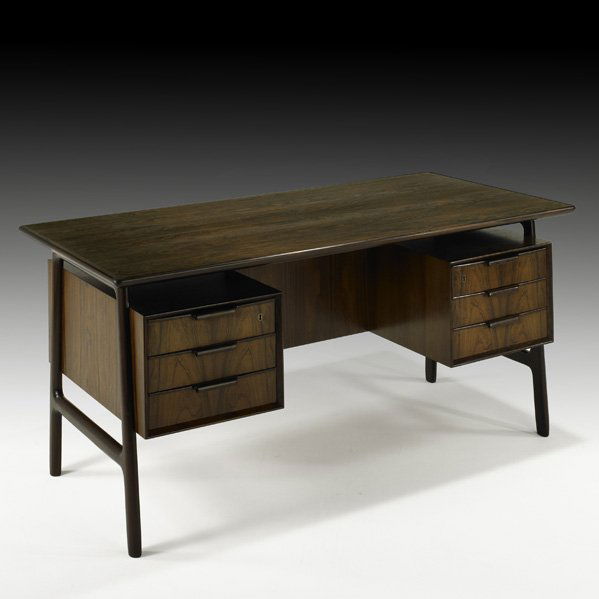 OMANN JUN Rosewood desk: OMANN JUN OMANN JUN MOBELFABRIK Rosewood desk (no. NR75), Denmark, 1960s; Brass label; 28 3/4" x 60 1/2" x 32"