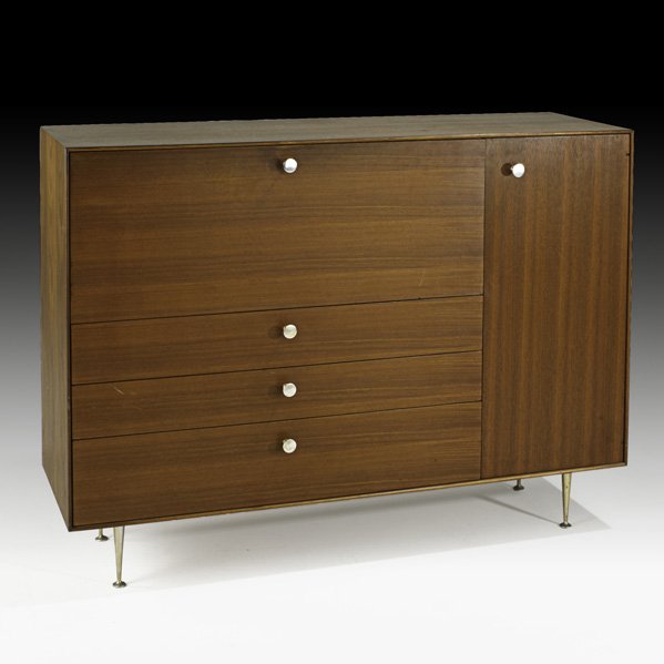 GEORGE NELSON Thin Edge secretary: GEORGE NELSON HERMAN MILLER Thin Edge secretary, USA, 1950s; Drop-front opens to divided shelving and four drawers in an illuminated interior; Walnut, polished and brushed aluminum, porcelain, leather