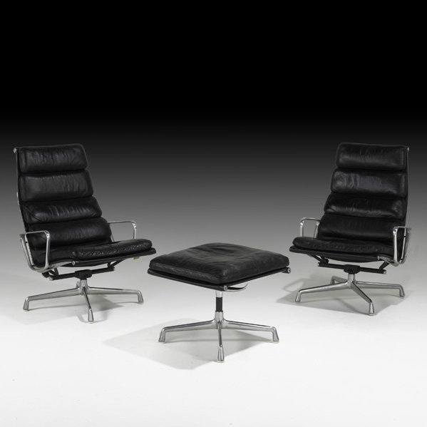 CHARLES AND RAY EAMES Pair of lounge chairs: CHARLES AND RAY EAMES HERMAN MILLER Pair of Soft Pad lounge chairs and ottoman, USA, 1979; Leather, cast aluminum; Labeled; Lounge chair: 39" x 25" x 30", ottoman: 18" x 22" x 21"