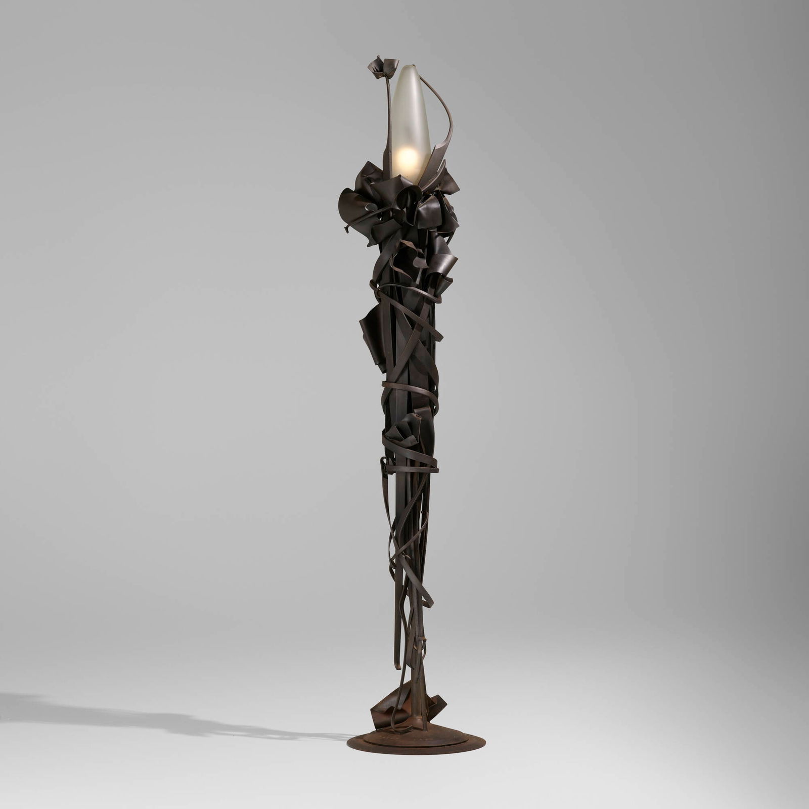 Albert Paley, Gumdrop floor lamp: Albert Paley Gumdrop floor lamp 1992forged and fabricated steel, glass 89 h x 18 dia in (226 x 46 cm) Impressed signature and date to base 'Albert Paley 1992'. This work is from the edition of