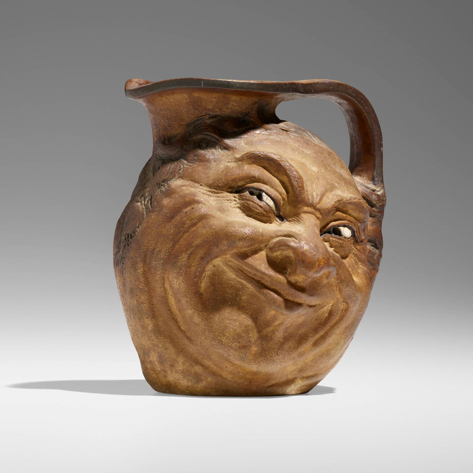 Robert Wallace Martin for Martin Brothers Pottery, Double face jug (1 of 3)
