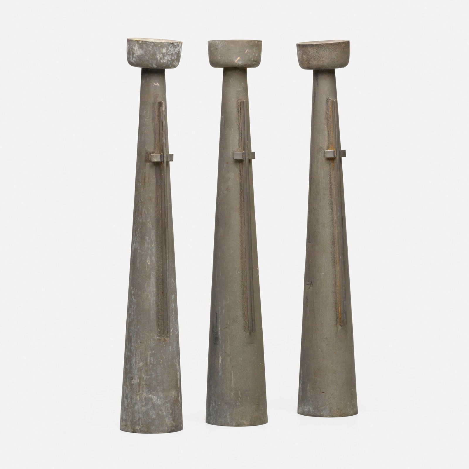 Paul Evans, Rare and Early candlesticks, set of three: Paul Evans Rare and Early candlesticks, set of three USA, c. 1953sandblasted pewter each: 20.5 h x 3.25 dia in (52 x 8 cm) Provenance: The Artist | Collection of Dorsey Readin