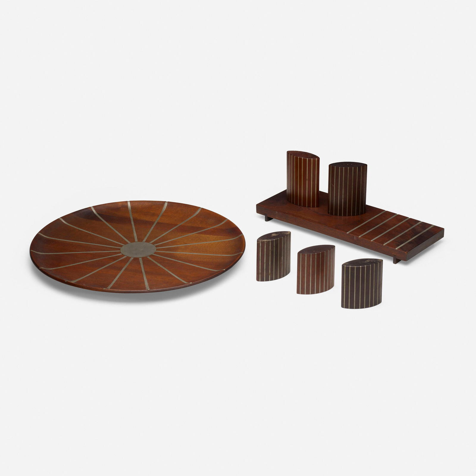 Paul Evans and Phillip Lloyd Powell, Collection of seven tabletop accessories: Paul Evans and Phillip Lloyd Powell Collection of seven tabletop accessories Designer's Inc.USA, 1956-57walnut, pewter, cork largest: 17.25 h x 1.25 dia in (44 x 3 cm) smallest: 3.5 h x 3.25