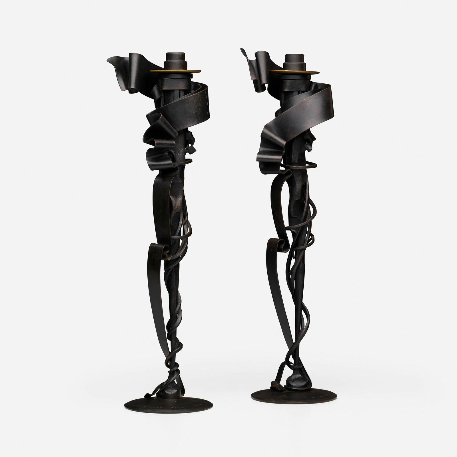 Albert Paley, Millennium candleholders, pair: Albert Paley Millennium candleholders, pair USA, 1998forged and fabricated steel with a blackened finish, removable brass bobeches (collars) 21 h x 6 w x 5.5 d in (53 x 15 x 14 cm) Impressed s