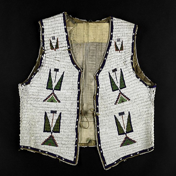 PLAINS INDIAN BEADED VEST: Lined with deer skin, late 19th c.; 21" x 19"