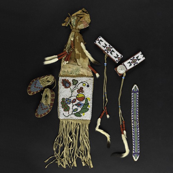 PLAINS INDIAN BEAD WORK;: Five items, late 19th/early 20th c.: three arm bands, pipe bag and pair of child's moccasins; Pipe bag: 25" x 6"